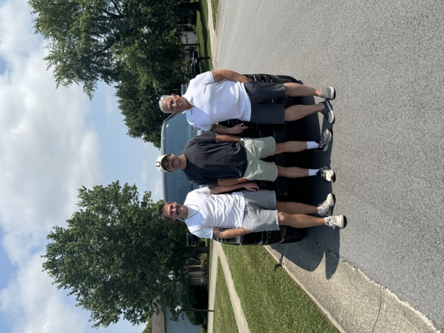 The family owners of Affordable Blinds Indy standing together outdoors